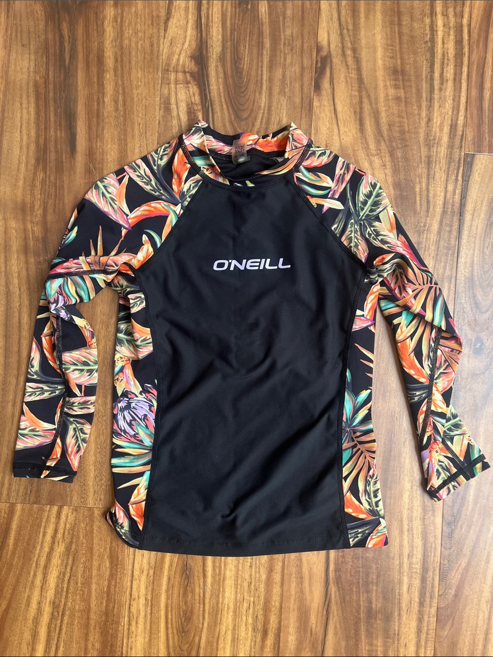 O'Neill Black Rash Guard with Tropical Multicolor Sleeves